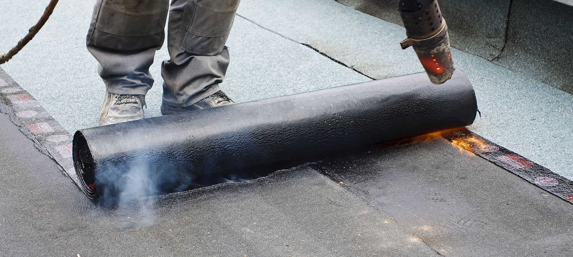 Built Up Flat Roofing Installing Roof Felt